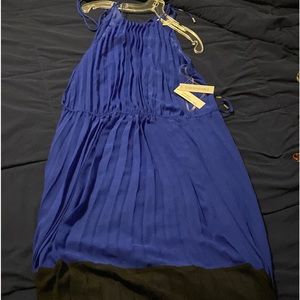 Dress is blue and black it is new with the tag still on it